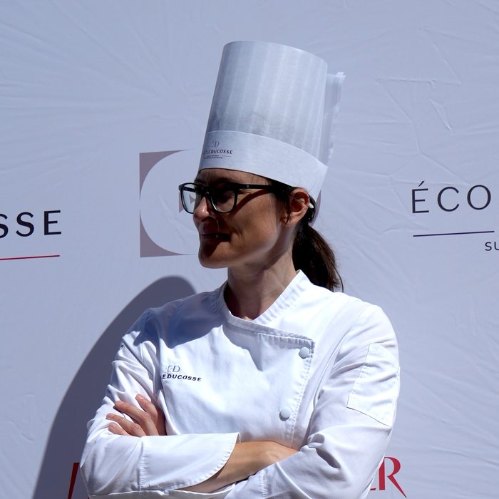 Nadya Denisenko in chef's whites and toque at the École Ducasse.
